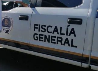 Localizan dos cuerpos encobijados en la orilla de la carretera