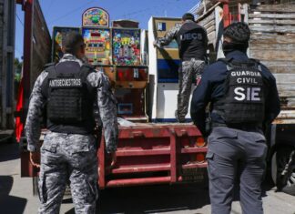 Autoridades federales y estatales aseguran 127 máquinas traga monedas en 8 cateos en Morelia