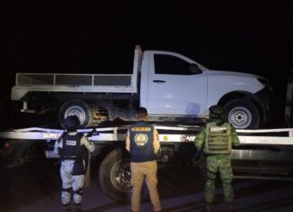 Desmantelan taller clandestino de blindaje de vehículos en Tepalcatepec; aseguran 4 autos robados