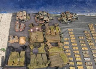 SSP y Defensa detienen a 5 hombres con arsenal en Apatzingán