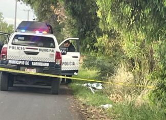 Encuentran cadáver encobijado en la carretera Morelia-Tarímbaro