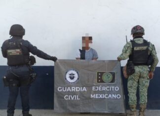 Asegurados dos hombres, un arma de fuego y droga en Apatzingán: SSP