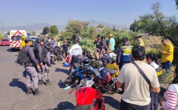 Choque de motocicletas deja lesionados en Morelia; uno cayó al Río Grande